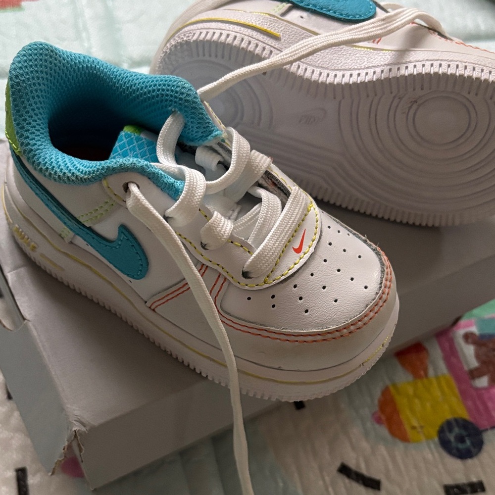 Nike Infant White Sneakers with Teal Accent